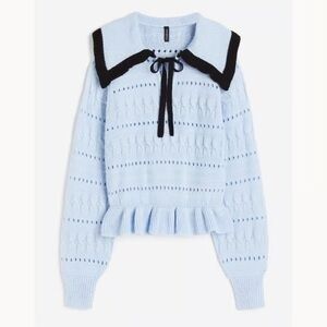 Divided Sky Blue Sweater with Black Collar
